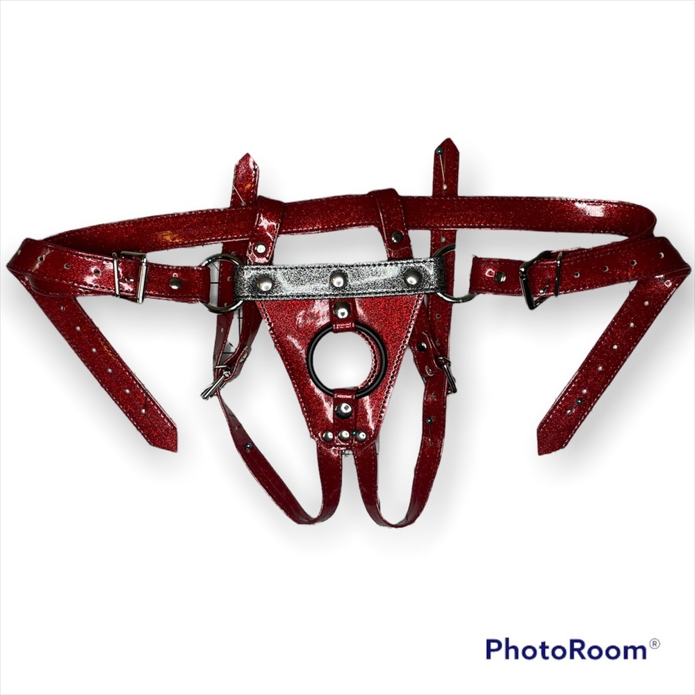 Strap on harness in glitter red with dark glitter grey accent. One size. NWOT.
